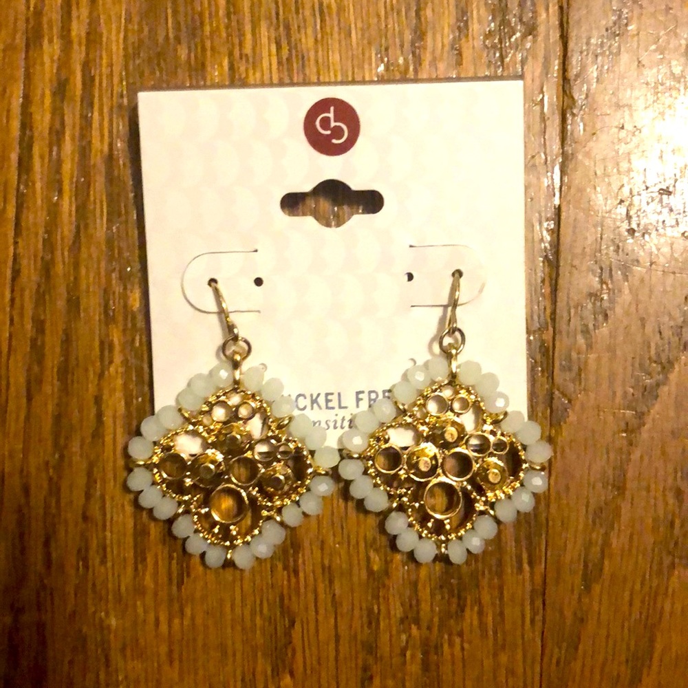 Nickel free gold center with light teal Crystal edged dangle earrings